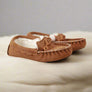 tan mocassin slippers in sheepskin